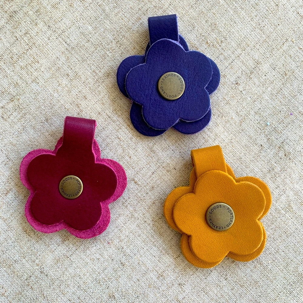 Bundle portland leather flower snaps.